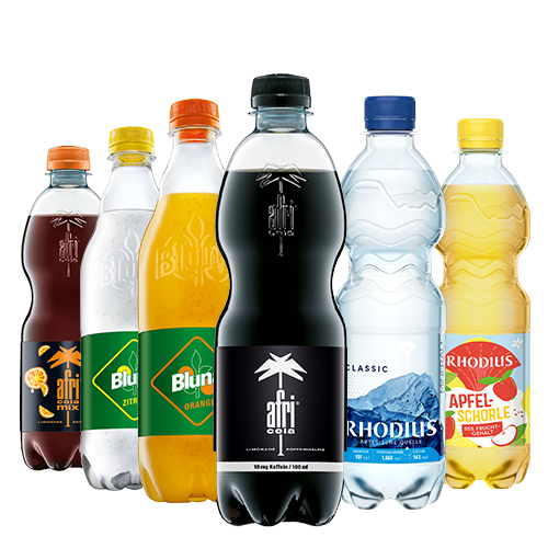 Various Petcycle bottles with 0.5 l from RHODIUS, afri Cola and Bluna stand next to each other.